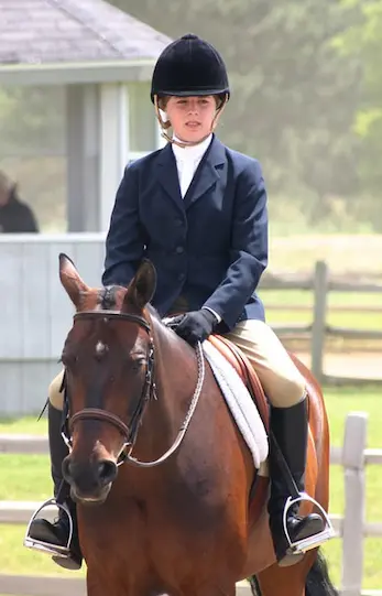 Typical clothing worn by English horse riders
