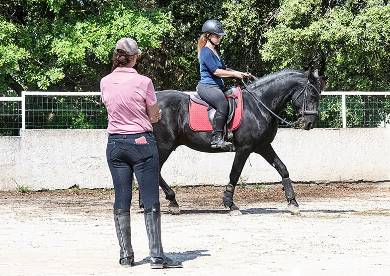 A good horseback riding instructor will help you work towards your goals